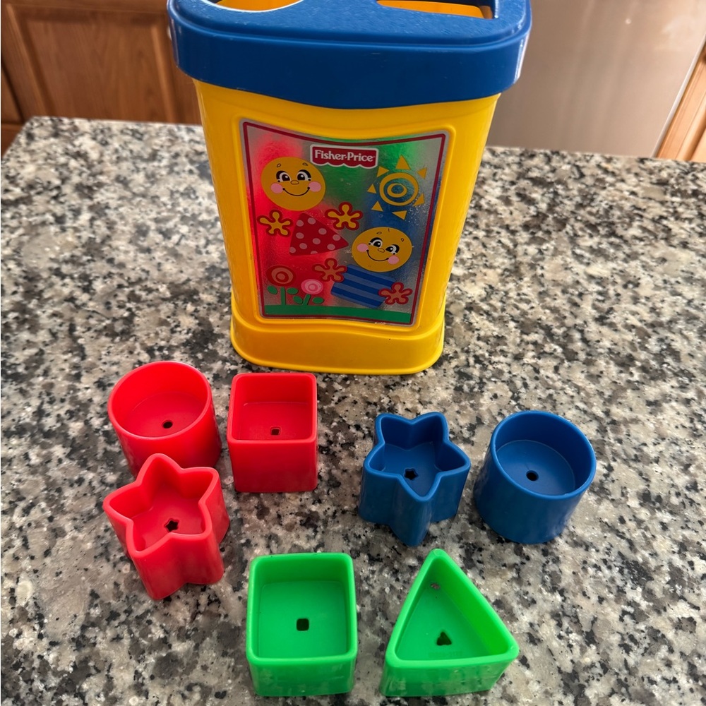 Fisher-Price Yellow Shape Sorter Bin with Red, Blue & Green Shapes